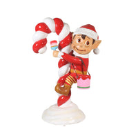 Red Elf On Candy Cane Statue