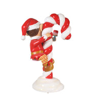 Red Elf On Candy Cane Statue