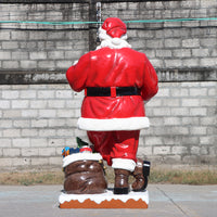 Giant Santa Claus With List Christmas Statue