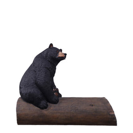 Black Bear on Tree Trunk Statue