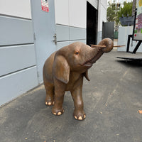 Walking Baby Elephant Calf Statue