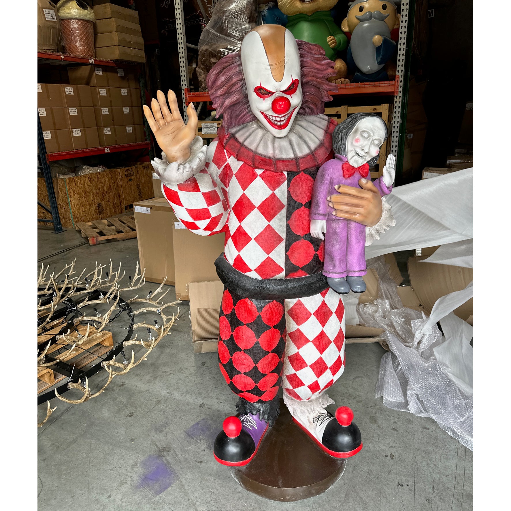 Scary Clown With Chainsaw Statue – LM Treasures Prop Rentals